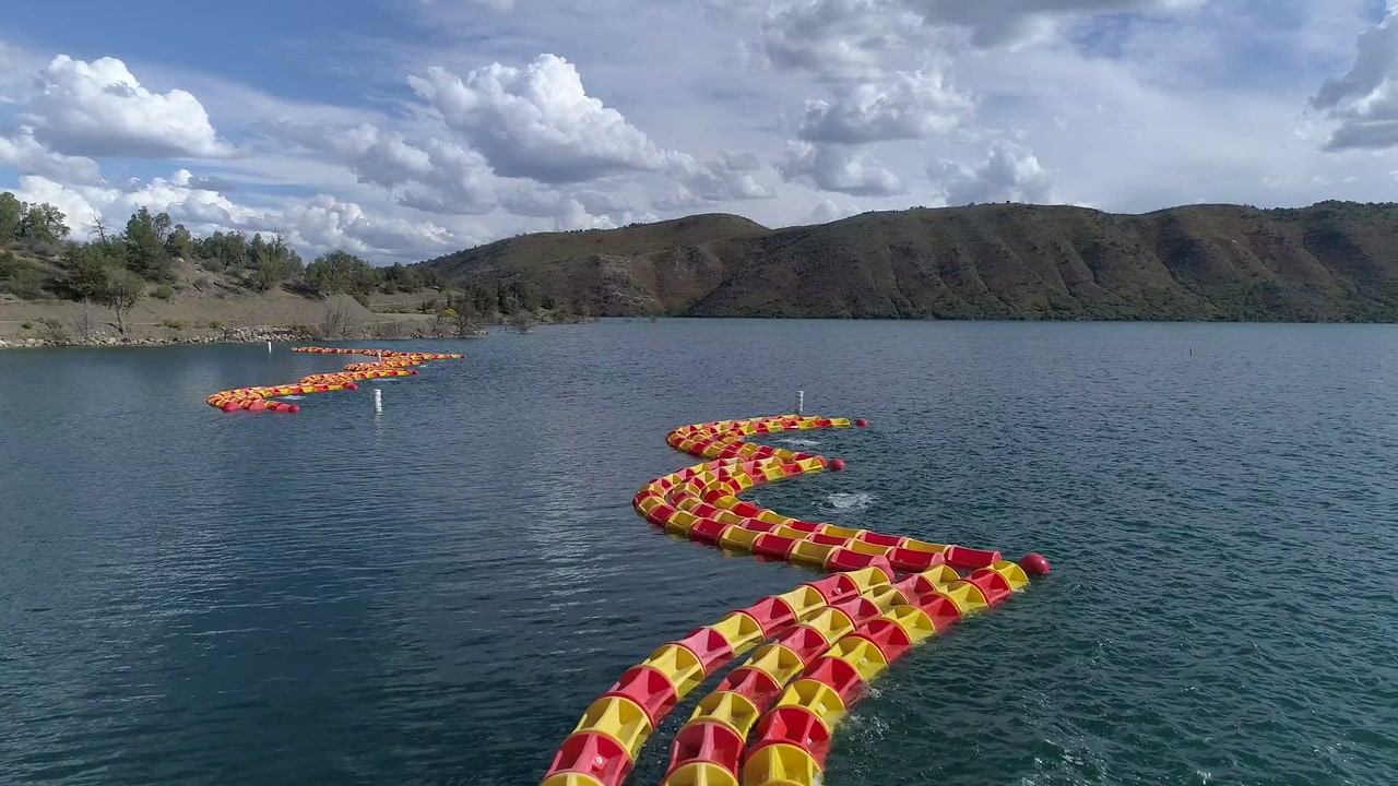 WaveEater breakwater running along a reservoir shoreline