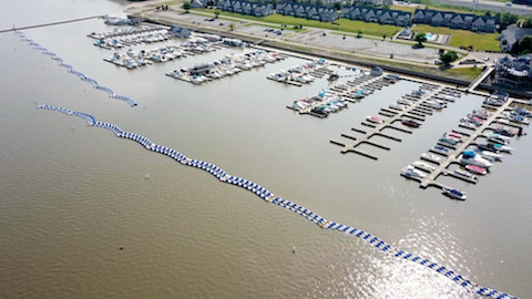 Aerial view of a marina protected by a WaveEater breakwater